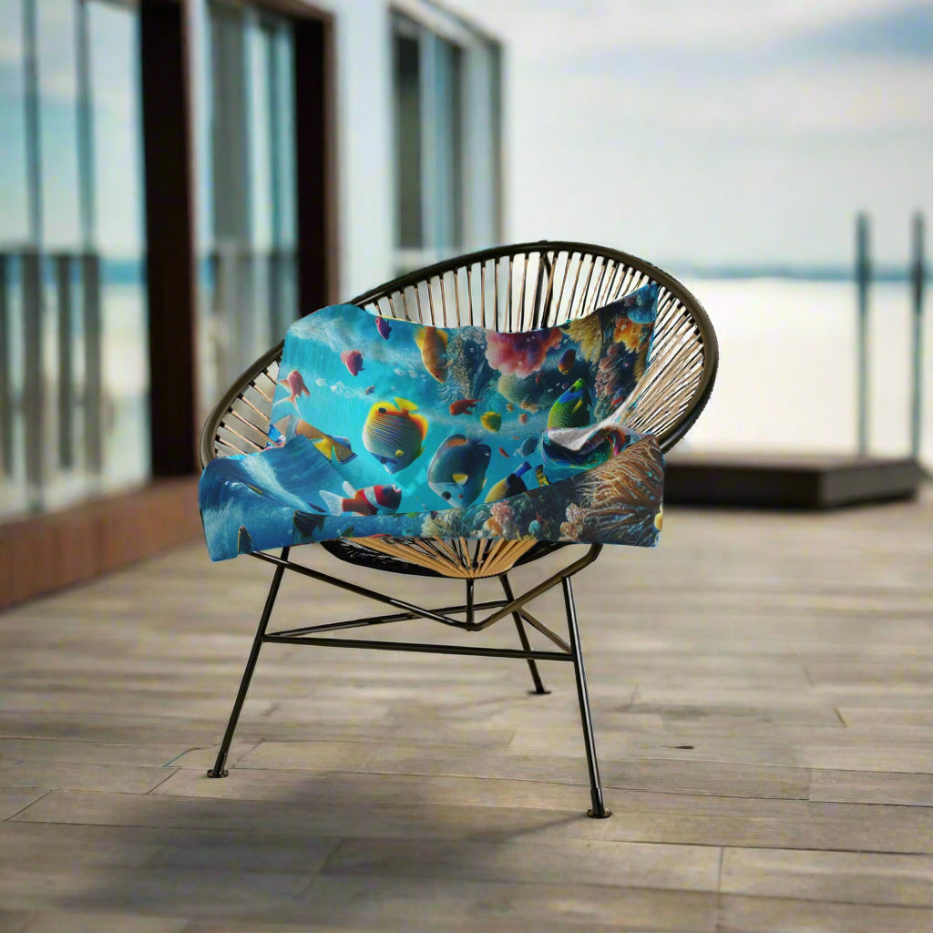 Chair with a colorful underwater-themed blanket .
